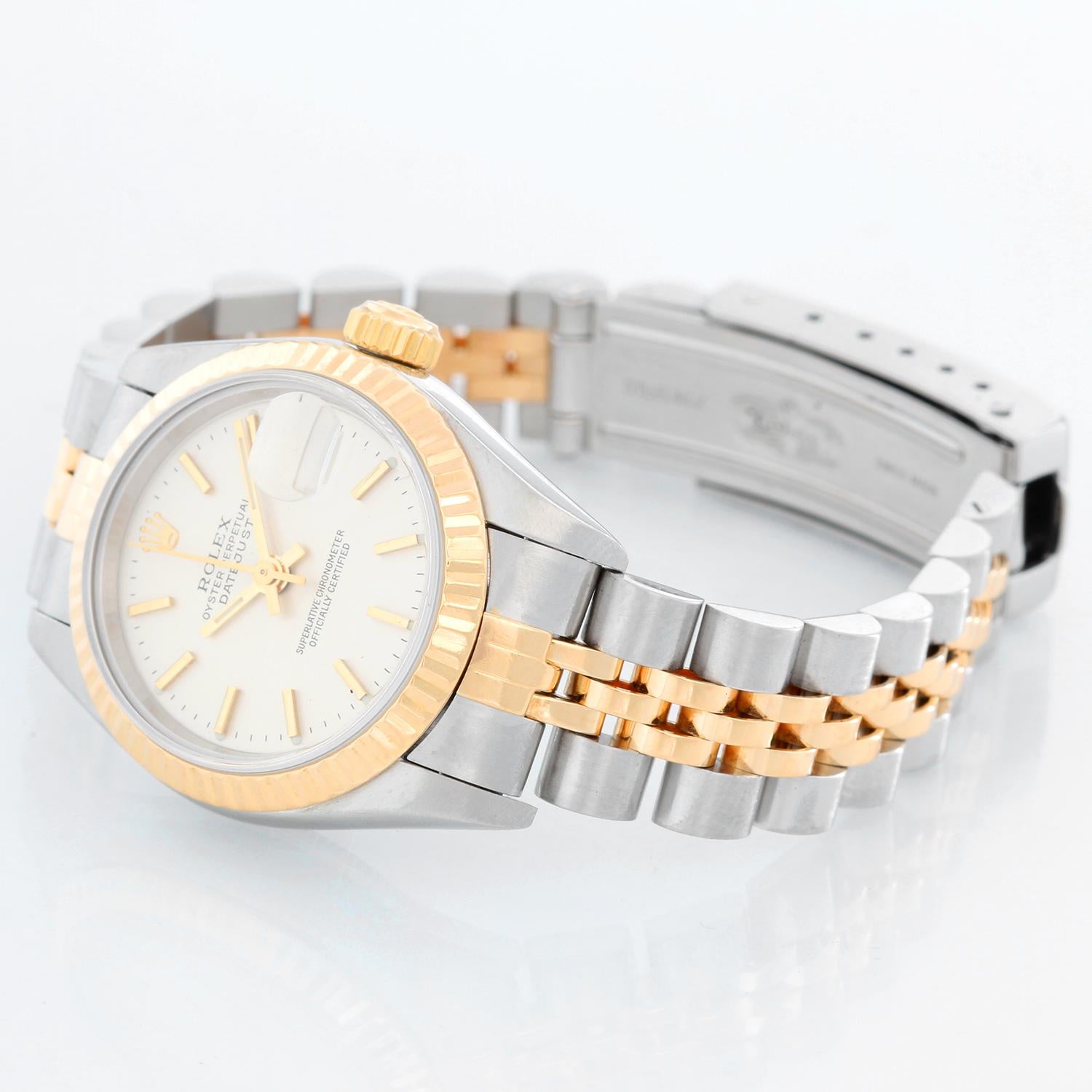 Rolex  2-Tone Datejust Steel & Gold Ladies Watch 69173 - Automatic winding, 29 jewels, Quickset date, sapphire crystal. Stainless steel case with 18k yellow gold fluted bezel . Silver dial with stick hour markers . 2-tone Jubilee bracelet. Pre-owned