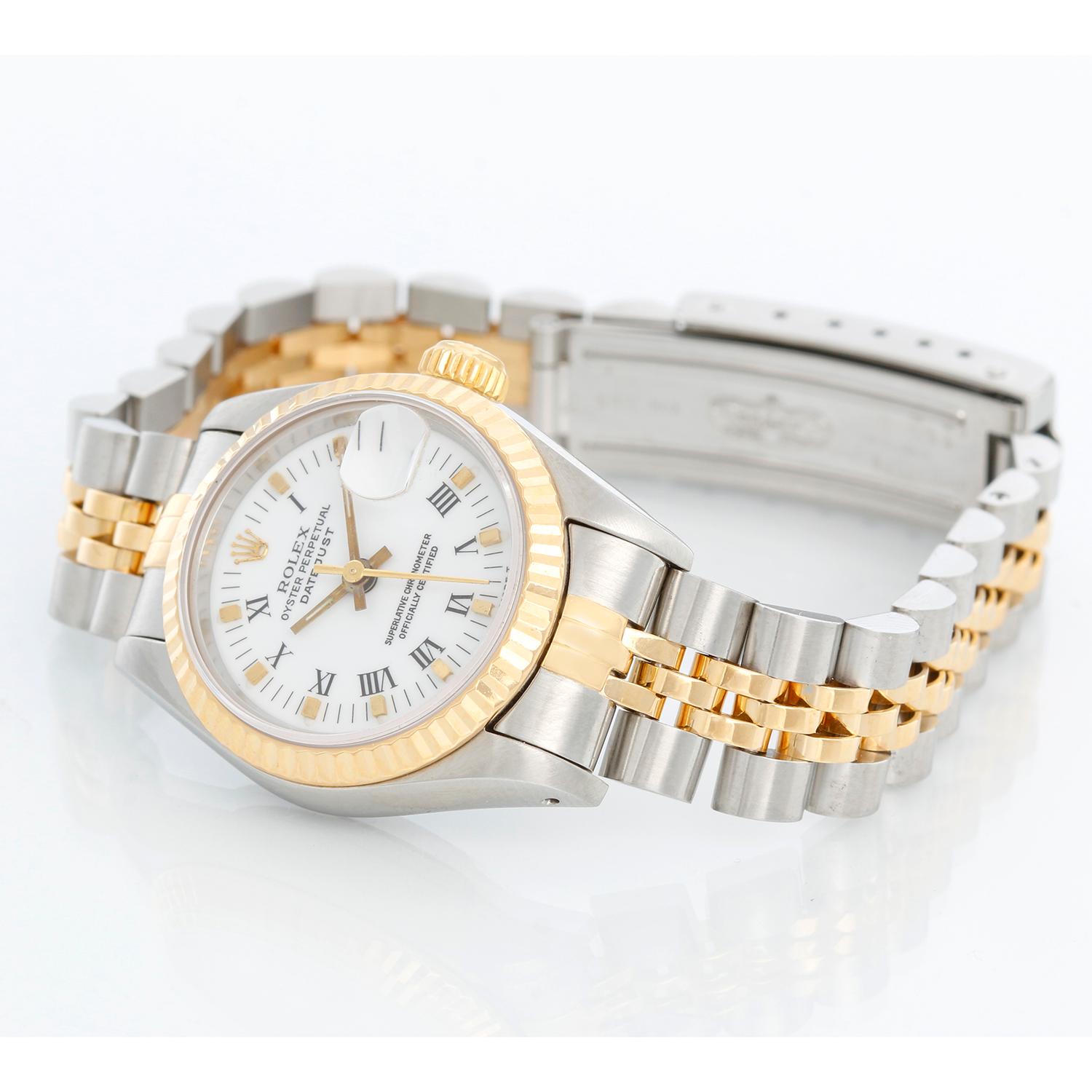 Rolex  2-Tone Datejust Steel & Gold Ladies Watch 69173 - Automatic winding, 29 jewels, Quickset date, sapphire crystal. Stainless steel case with fluted bezel. White dial with Roman numerals and gold markers . Stainless steel and 18k yellow gold