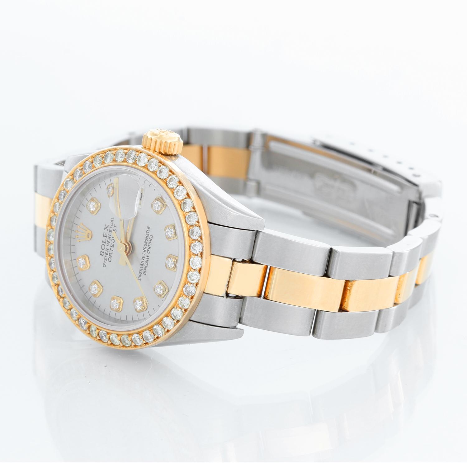 Rolex  2-Tone Datejust Steel & Gold Ladies Watch 69173 - Automatic winding, 29 jewels, Quickset date, sapphire crystal. Stainless steel case with custom diamond bezel ( 26 mm) . Custom silver diamond dial. Stainless steel and 18k yellow gold oyster