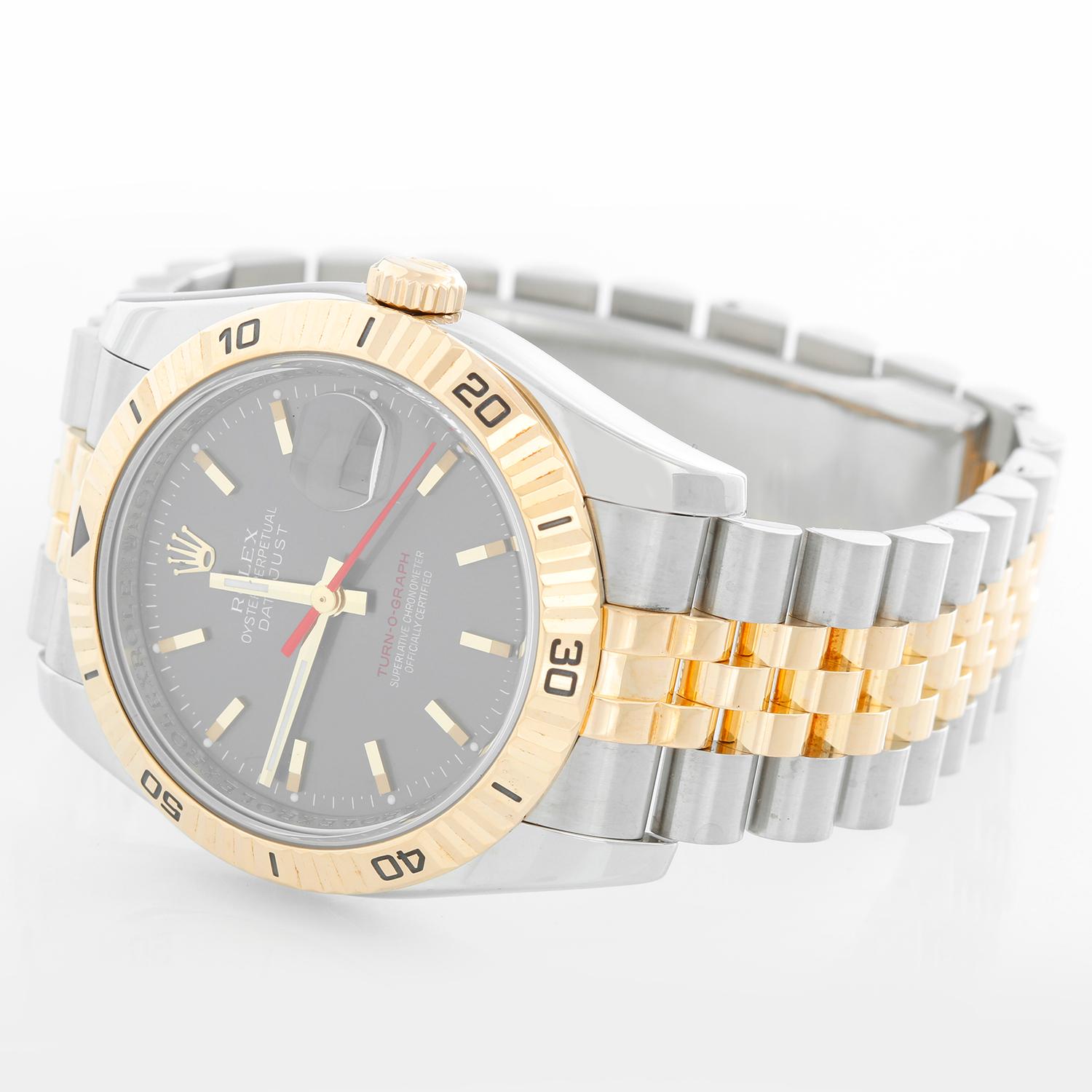 Rolex 2-Tone Turnograph Men's Steel & Gold Watch Slate Dial 116263 - Automatic winding with date; sapphire crystal; 31 jewels. Stainless steel case with 18k yellow gold rotating Thunderbird bezel  (36mm diameter). Slate gray dial with gold stick