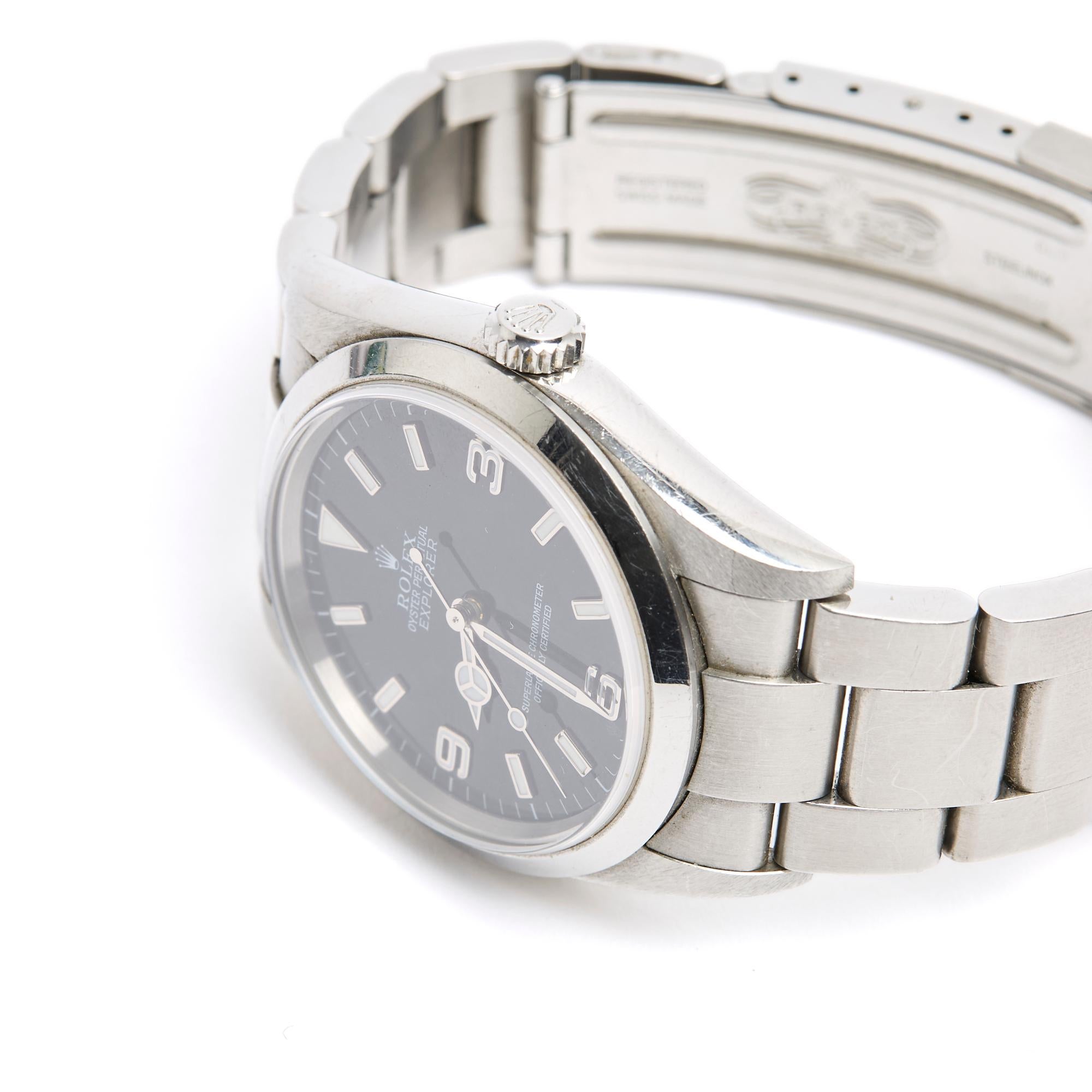 Orologio Rolex serie Oyster Perpetual modello Explorer I circa 2007, carica automatica, cassa rotonda in acciaio diametro 36 mm (corona esclusa), quadrante nero con numeri arabi e indici a bastone, bracciale in acciaio con chiusura pieghevole per