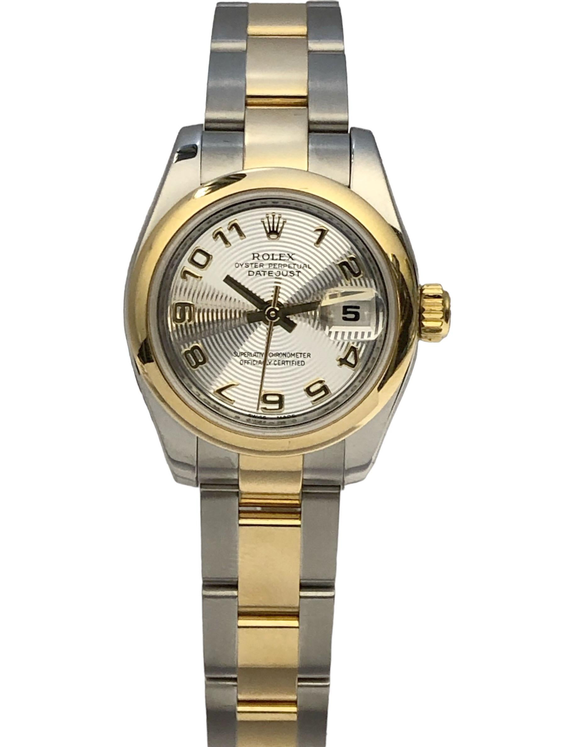 Circa 2017 Rolx Ladies Ref 179163 Wrist Watch, 26 M.M. 2 piece water resistant stainless steel case with 18k Yellow Gold Bezel and Yellow Gold Crown, 29 Jewel Automatic, Self winding movement, Hard to find Silver Concentric, Engine turned dial with
