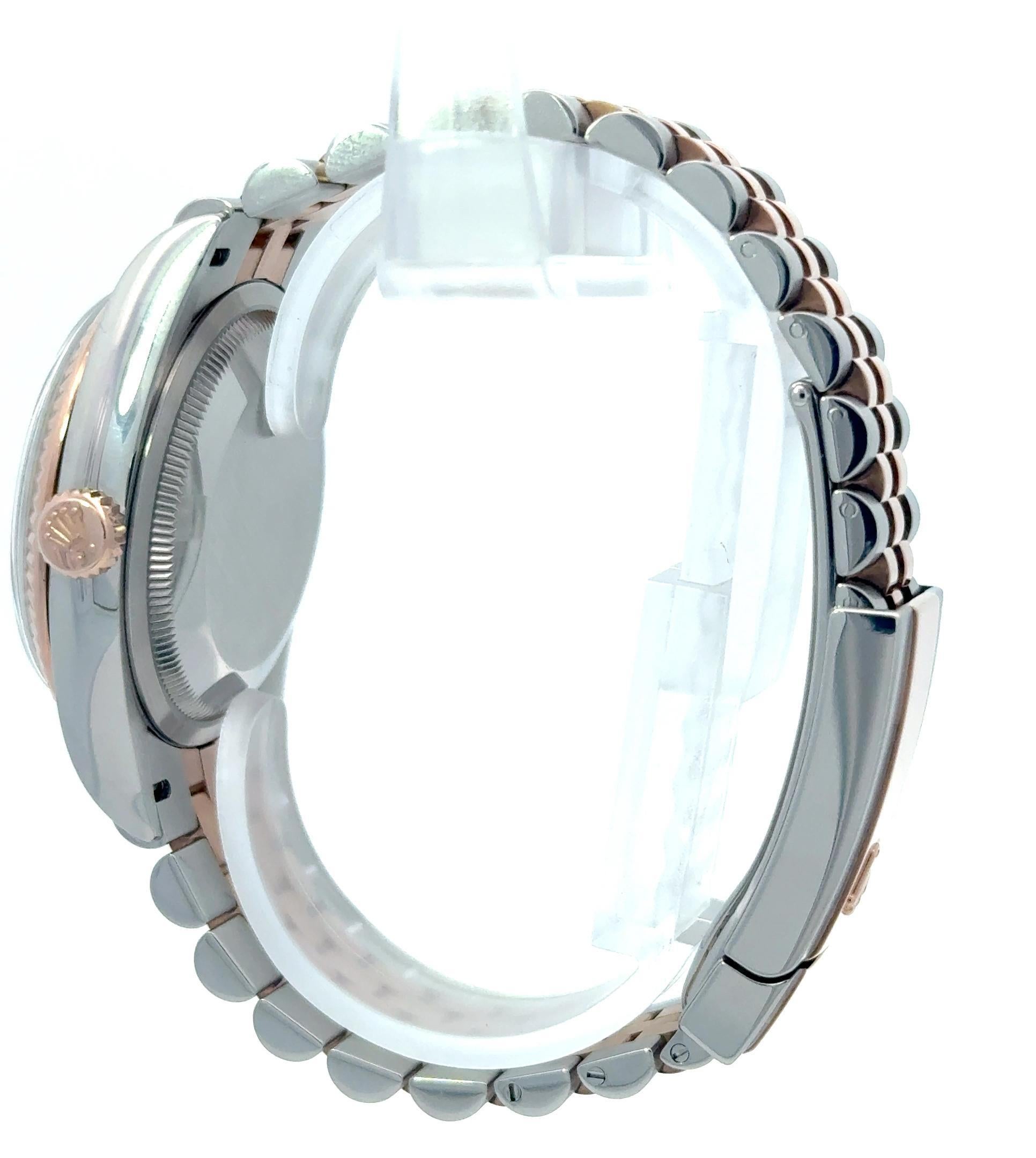The 2020 Rolex Datejust 126231 Two Tone 36mm Rhodium Dial is a refined blend of classic design and modern elegance. Crafted from Rolex’s signature Oystersteel and 18k Everose gold, it features a fluted bezel that enhances its timeless appeal. The