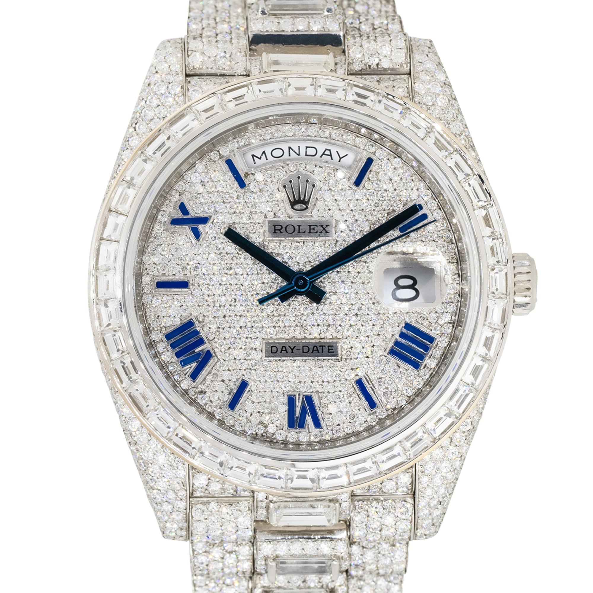 Brand: Rolex
Case Material: Platinum
Case Diameter: 40mm
Crystal: Sapphire Crystal
Bezel: Platinum with Diamonds
Dial: All Diamond dial with blue hands and blue Roman numerals. Date can be found at 3 o'clock and day can be found at 12