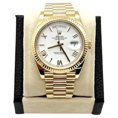 Rolex 228238 President Day Date 40mm White Roman Dial 18K Yellow Gold Box Paper