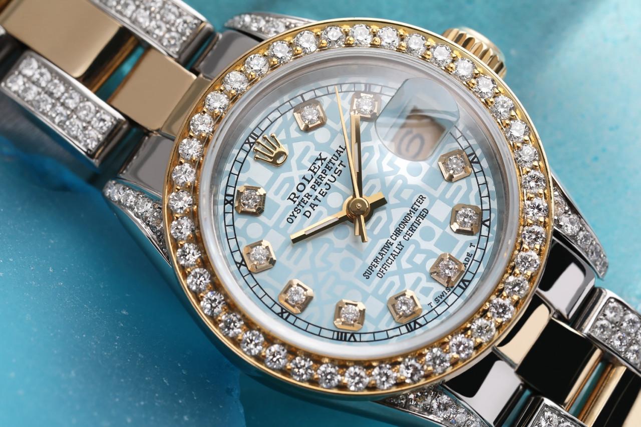 Rolex 26mm Baby Blue Jubilee Diamond Dial 18K Gold + SS + Side Diamonds Oyster Band + Bezel 69173

This watch is in like new condition. It has been polished, serviced and has no visible scratches or blemishes. All our watches come with a standard 1