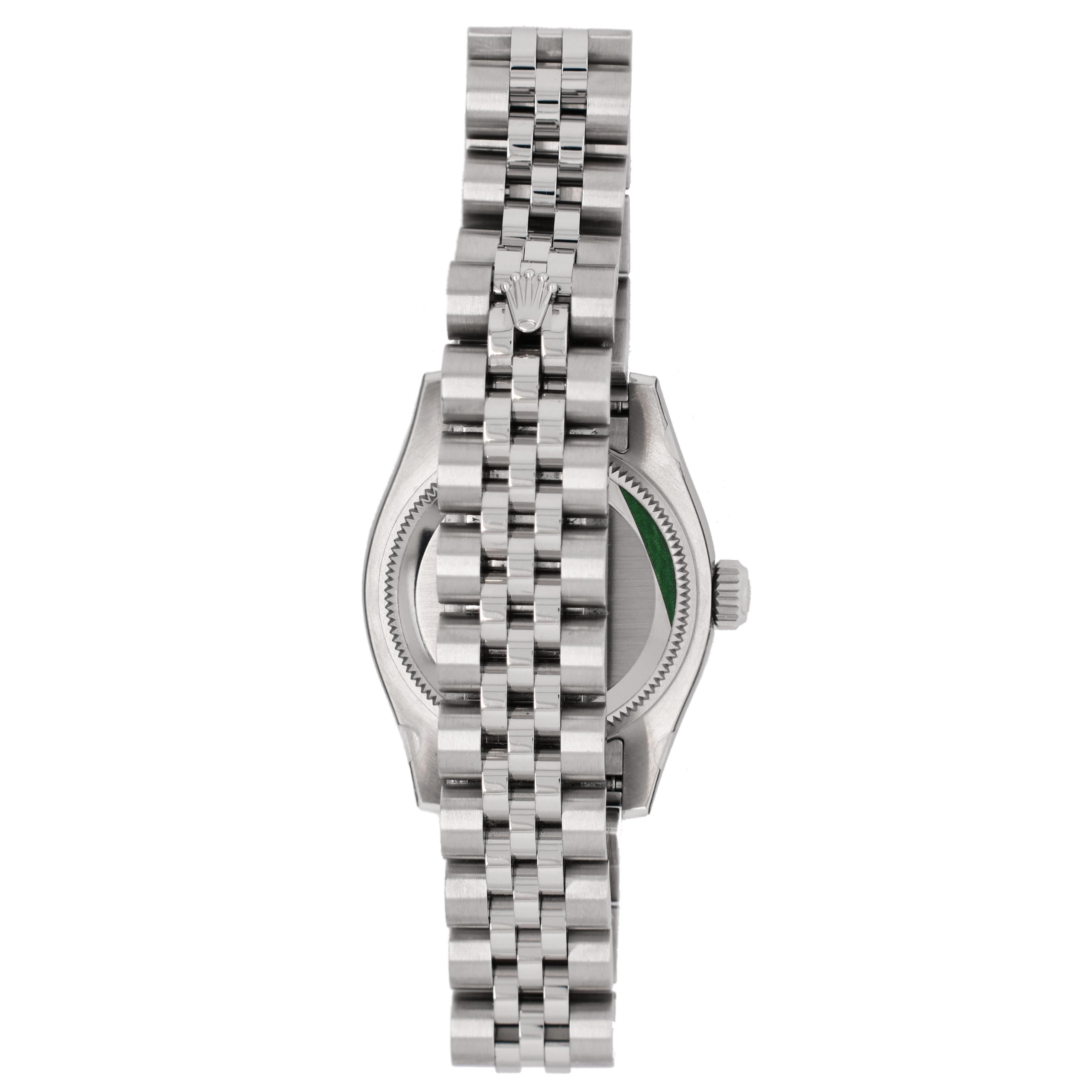 This is a brand new Rolex ladies Datejust reference 179384 with a factory Rolex Mother of Pearl diamond dial and a factory Rolex diamond bezel. The watch case and jubilee bracelet are stainless steel with an 18 karat white gold bezel. This timeless,