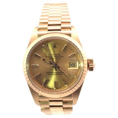 Rolex 26mm Datejust 18 karat yellow gold