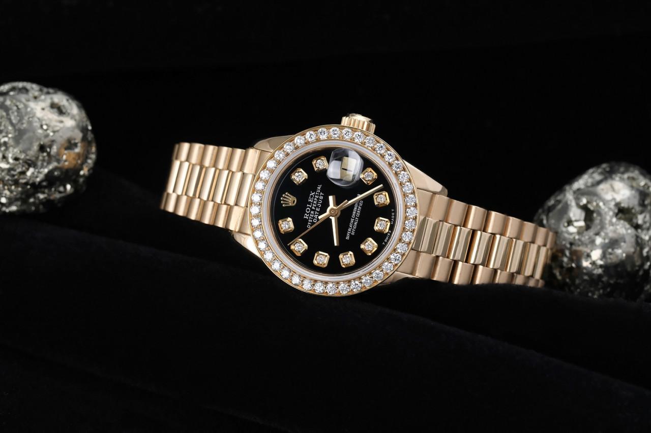 Rolex 26mm Datejust 18kt Gold Black Color Dial with Diamond Accent Diamond Bezel In Excellent Condition For Sale In New York, NY