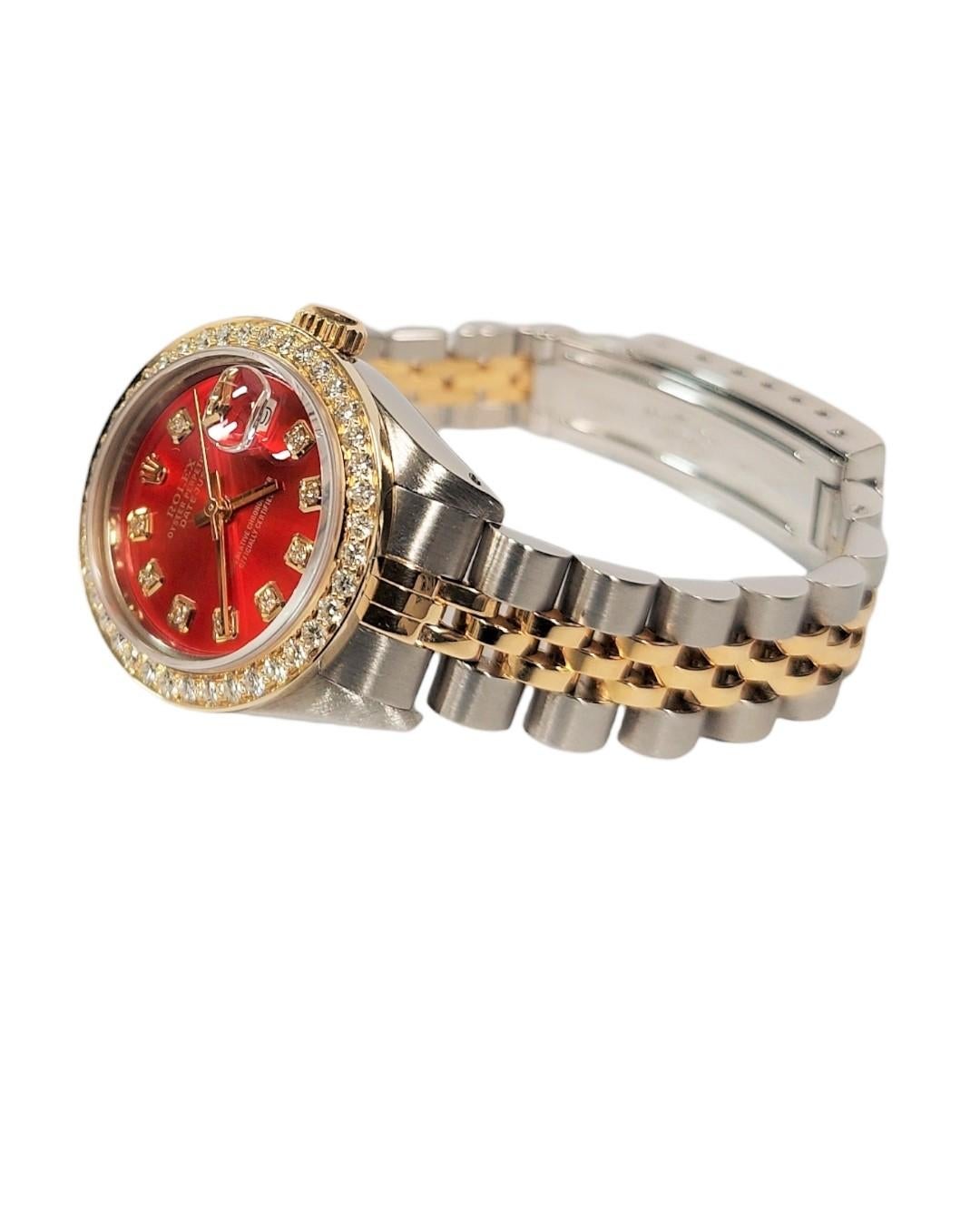 (Watch Description)
Brand - Rolex
Gender - Ladies
Model - 6917 Datejust
Metals - Yellow Gold / Steel 
Case size - 26mm
Bezel -Yellow Gold Fluted
Crystal - Sapphire
Movement - Automatic caliber 2030
Dial - Refinished Red Diamond
Wrist band - Two