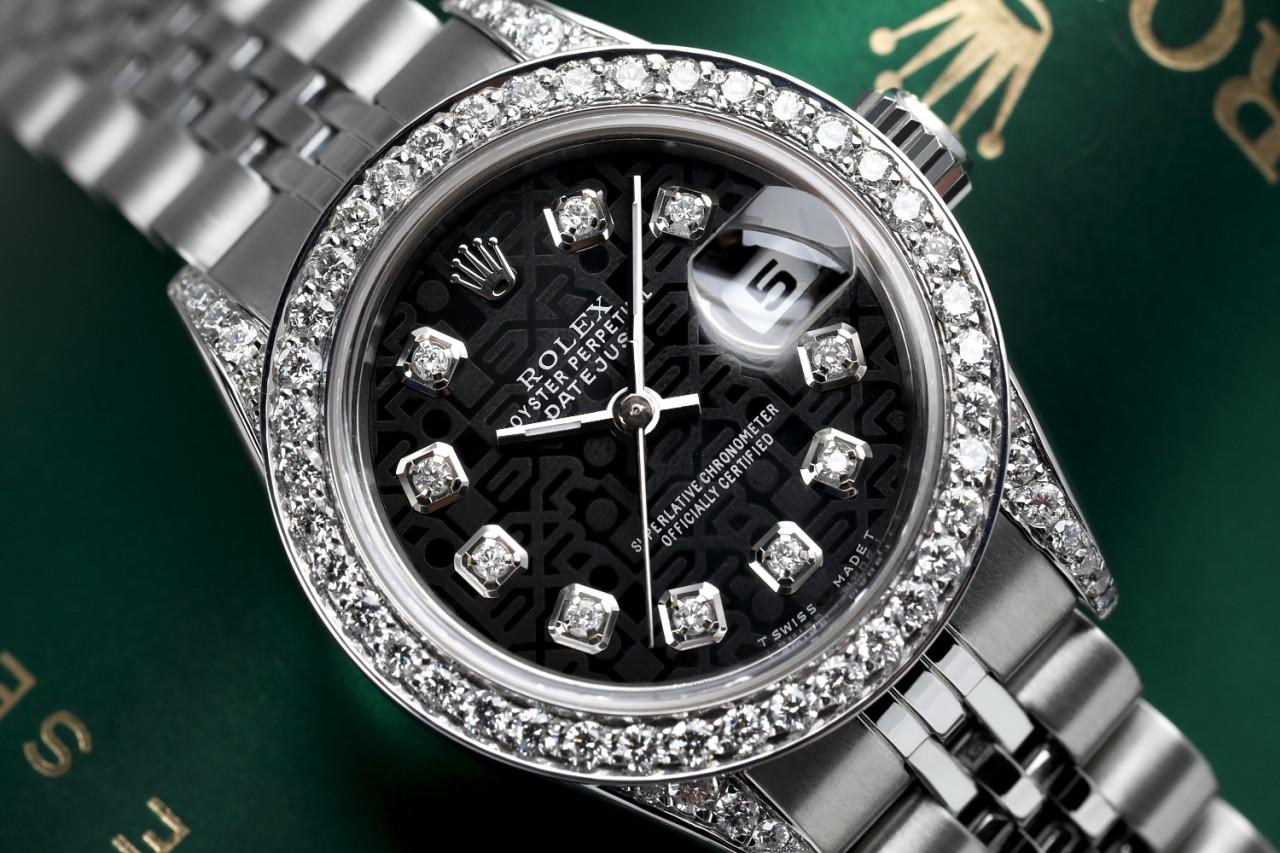 Rolex 26mm Datejust Black Jubilee Diamond Dial Custom Diamond Bezel and Lugs Jubilee Band 69174

This watch is in like new condition. It has been polished, serviced and has no visible scratches or blemishes. All our watches come with a standard 1