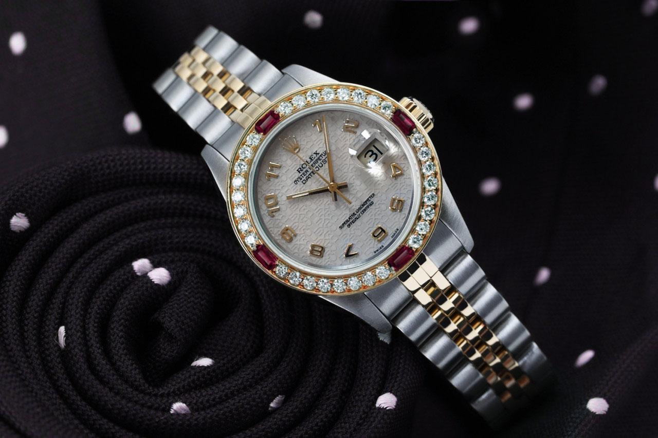  We take great pride in presenting this timepiece, which is in impeccable condition, having undergone professional polishing and servicing to maintain its pristine appearance. The watch features aftermarket diamonds (non-Rolex), and there are no