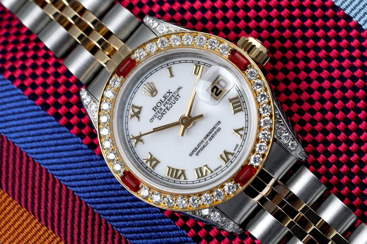 Ladies Rolex 26mm Datejust Two Tone Jubilee White Roman Numeral Dia Bezel + Lugs + Rubies 69173

This watch is in like new condition. It has been polished, serviced and has no visible scratches or blemishes. All our watches come with a standard 1