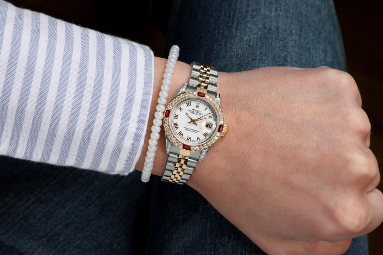 Rolex Datejust Jubilee White Roman Numeral Dia Bezel + Lugs + Rubies 69173 In Excellent Condition For Sale In New York, NY