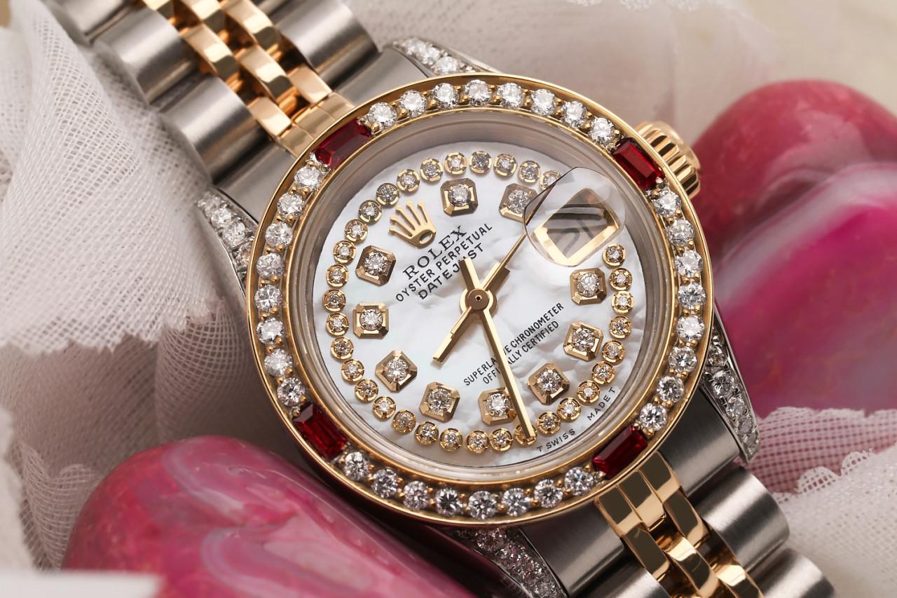 Ladies Rolex 26mm Datejust Two Tone Jubilee White MOP String Diamond Dial Bezel + Lugs + Rubies 69173

This watch is in like new condition. It has been polished, serviced and has no visible scratches or blemishes. All our watches come with a