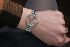 Rolex Datejust Salmon Roman Dial Diamond Bezel Steel Watch