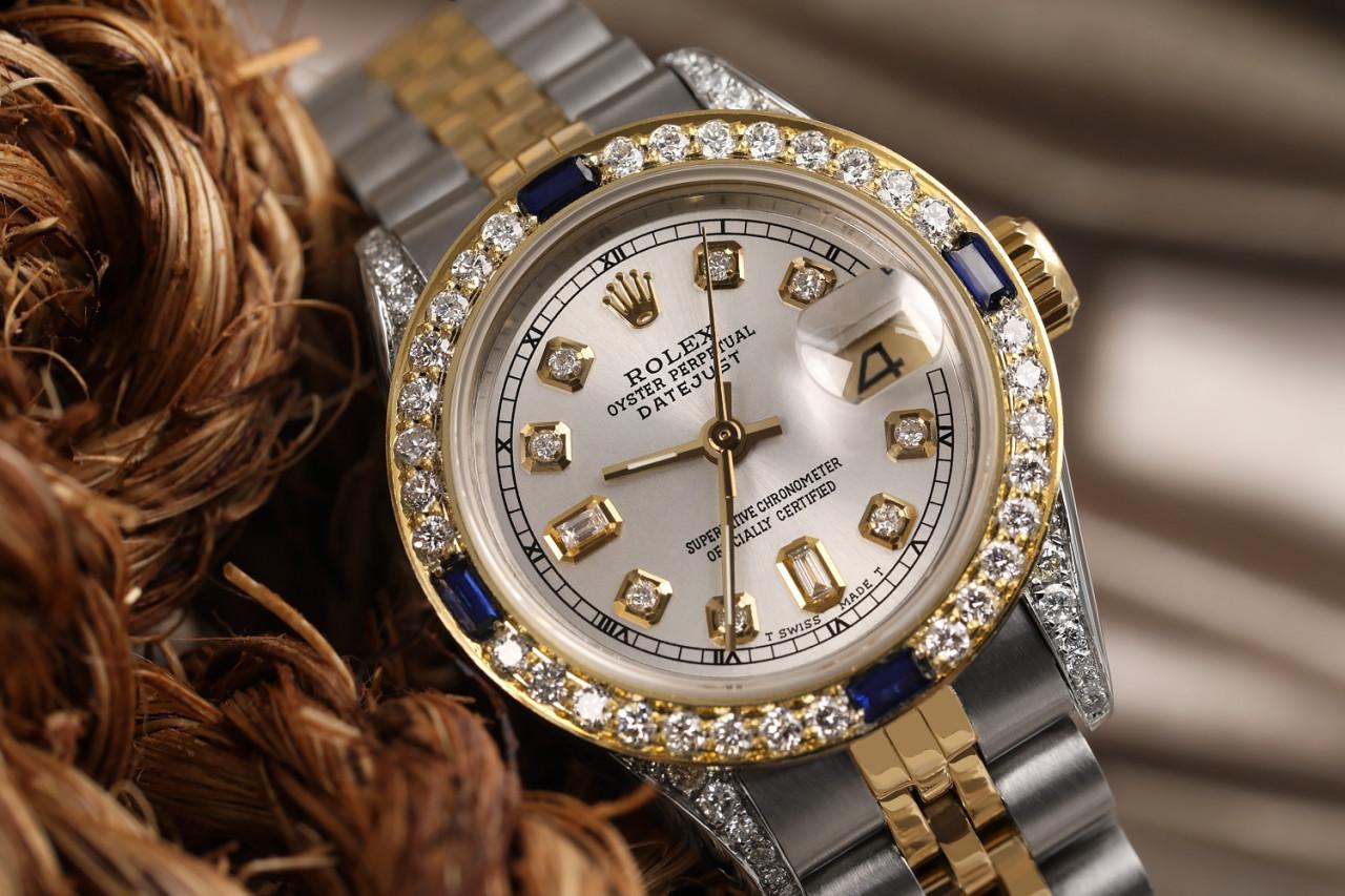 Ladies Rolex 26mm Datejust Two Tone Jubilee Silver Color Dial 8 + 2 Diamond Accent Bezel + Lugs + Sapphire 69173

This watch is in like new condition. It has been polished, serviced and has no visible scratches or blemishes. All our watches come