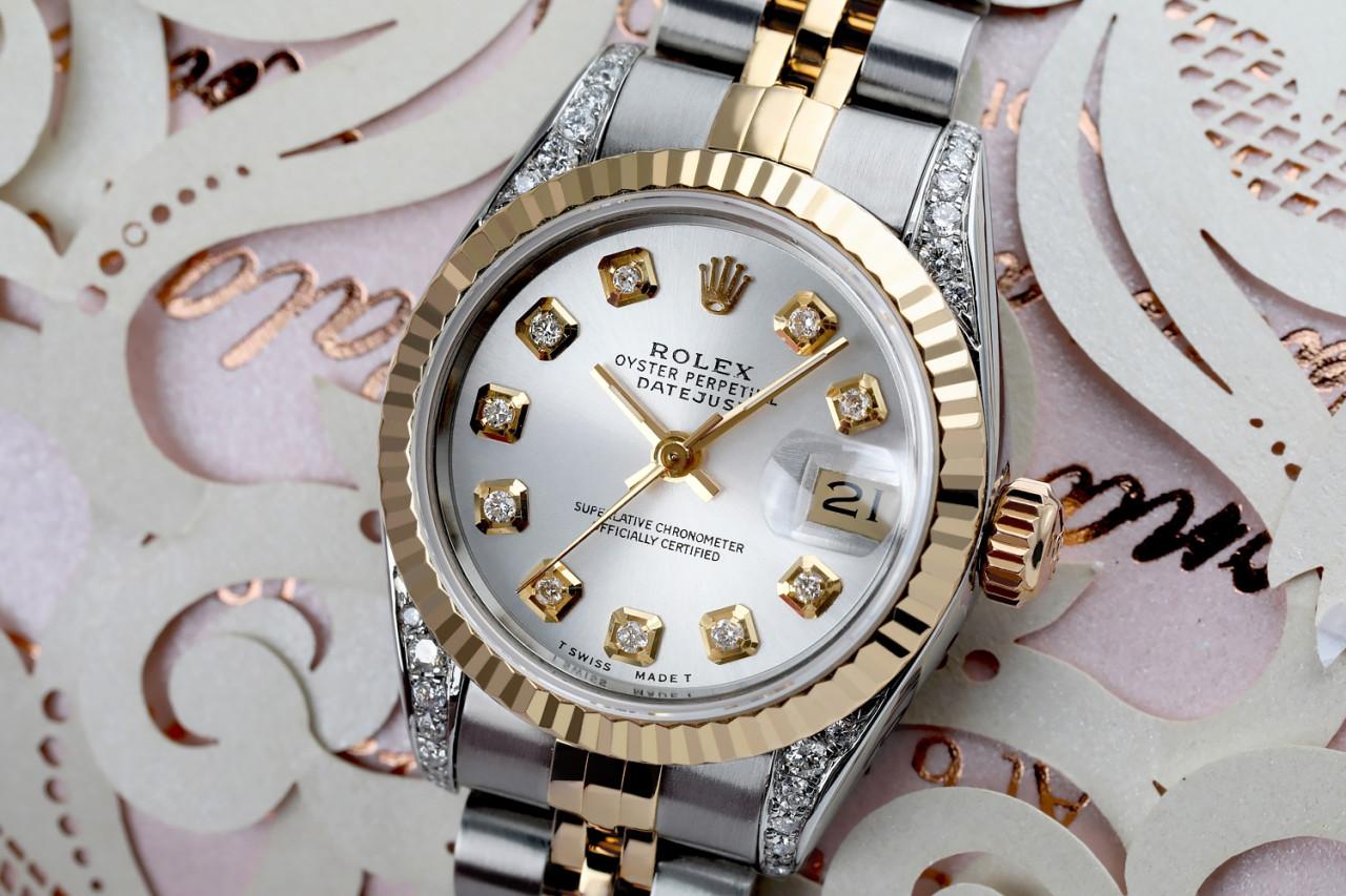 Ladies Rolex 26mm Datejust Two Tone Vintage Fluted Bezel With Diamond Lugs Silver Color Dial 69173

This watch is in like new condition. It has been polished, serviced and has no visible scratches or blemishes. All our watches come with a standard 1