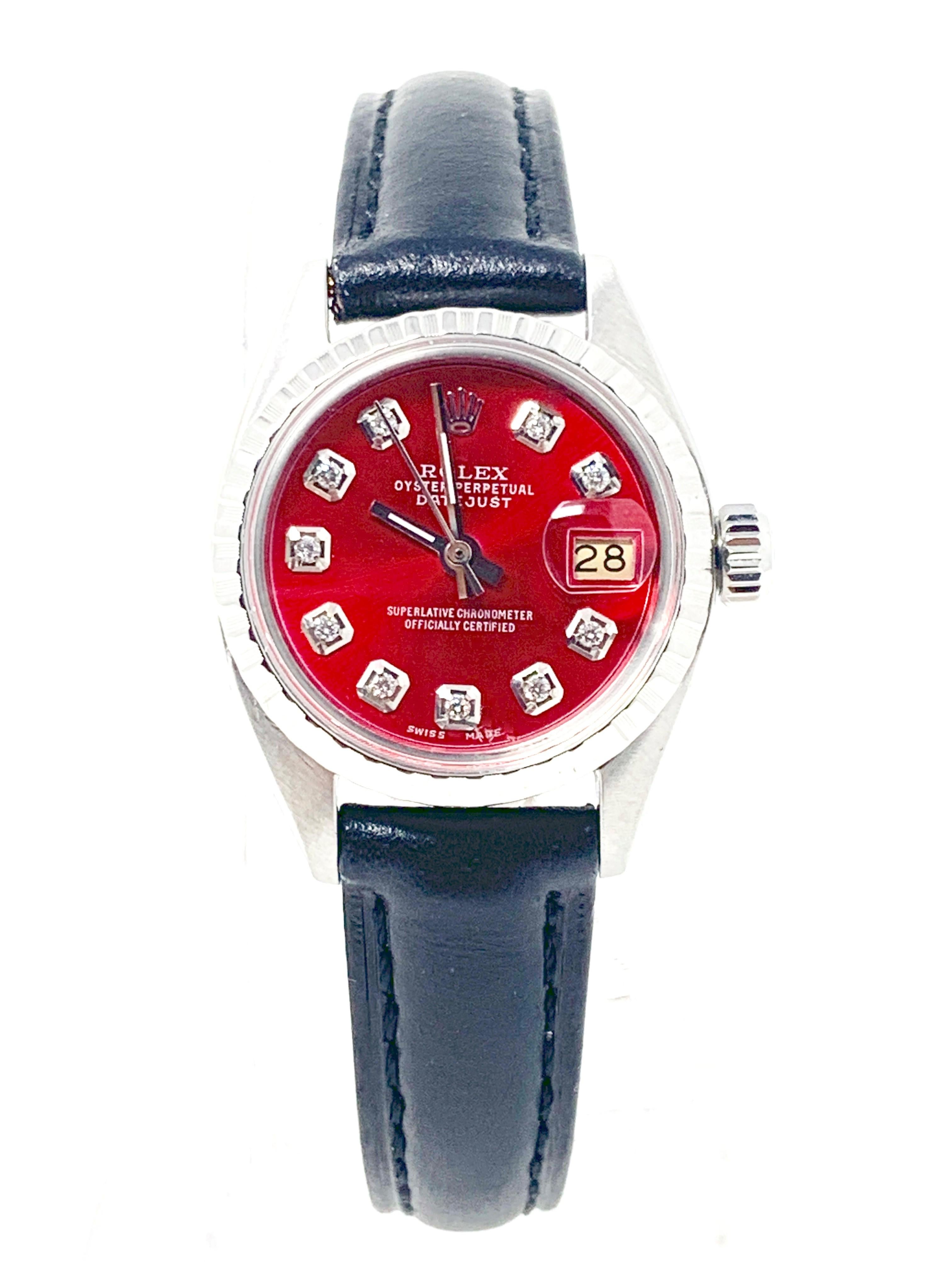 (Watch Description)
Brand - Rolex
Gender - Ladies
Model - 6516 Datejust 
Metals - Stainless steel 
Case size - 26mm
Bezel - Engine turn steel 
Crystal - Acrylic
Movement - Automatic Cal.1161
Dial - Red diamond
Wrist band - Black leather
Wrist size -