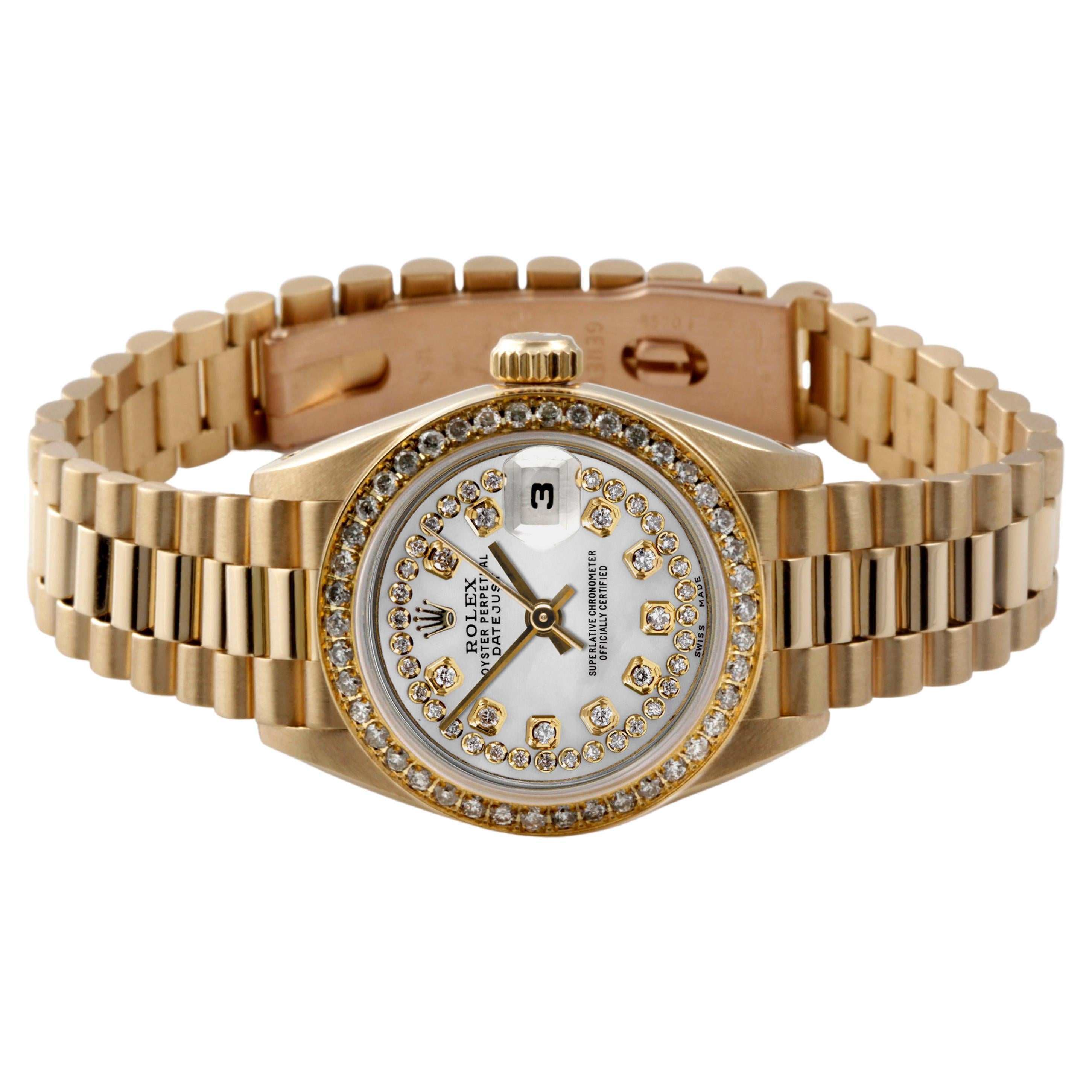 Brand - Rolex
Gender - Ladies
Model - 69178  Datejust/president
Metals - 18k Yellow Gold
Case size - 26mm
Bezel - Yellow Gold Diamond
Crystal - sapphire
Movement - Automatic Cal.2135
Dial - Refinished String Diamond
Wrist band - Yellow gold
