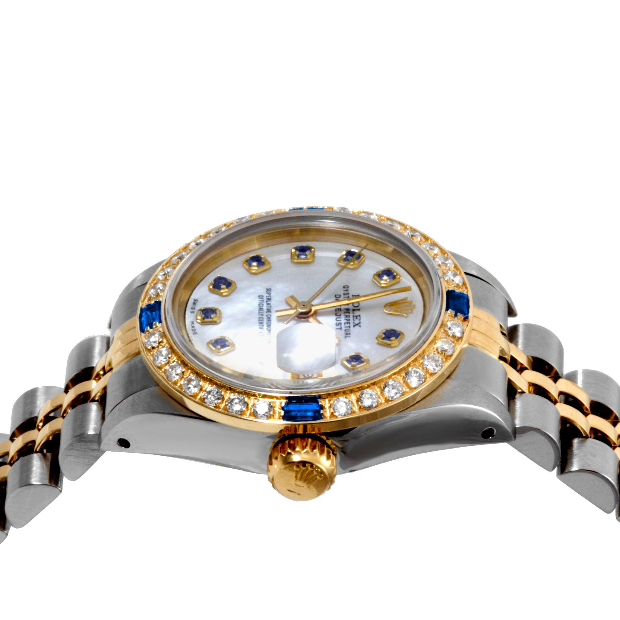 (Watch Description) 
Brand - Rolex
Gender - Ladies
Model - 69173 Datejust
Metals - Steel / Yellow Gold
Case size - 26mm
Bezel - Yellow Gold Diamond/Sapphire
Crystal - sapphire
Movement - Automatic Cal.2135
Dial - Refinished Mother of pearl