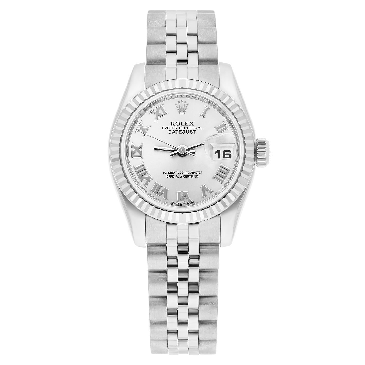 Introducing the stunning Rolex Lady-Datejust 179174 wristwatch, a timeless piece that exudes luxury and sophistication. This Swiss-made watch features a round 26mm case made of stainless steel and a white gold fluted bezel. The elegant silver dial