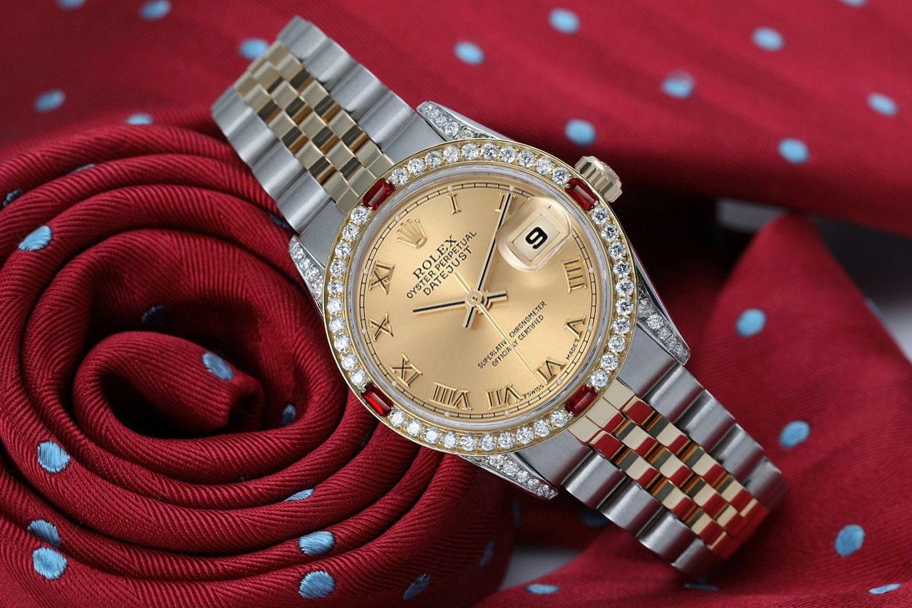 Rolex Datejust Champagne Roman Dial Diamond Bezel and Lugs Two Tone Watch In Excellent Condition For Sale In New York, NY
