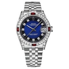 Rolex Montre Datejust avec cadran bleu Vignette personnalisé en diamants et rubis sur lunette et diamants