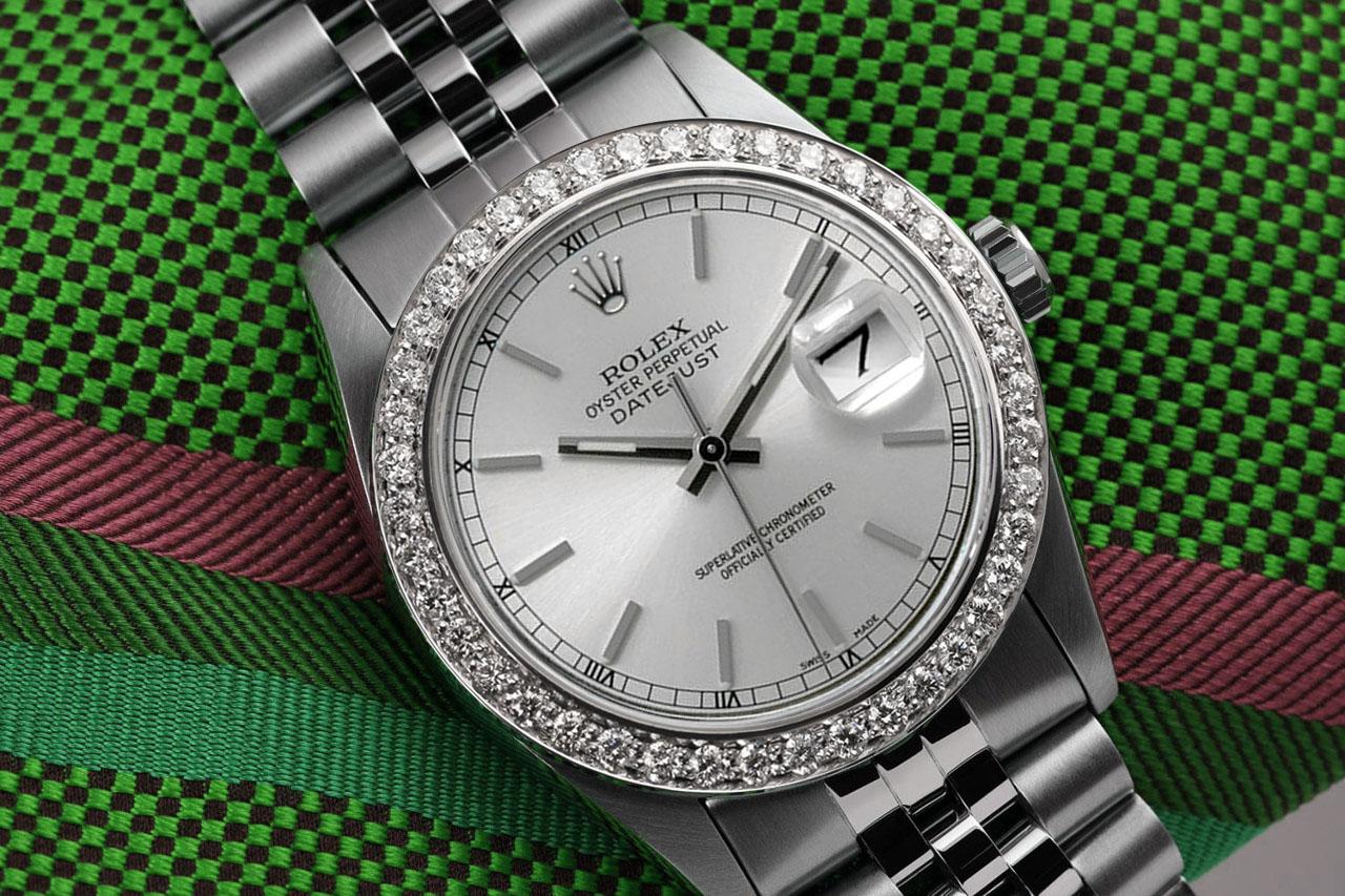 Rolex 31mm Datejust Diamond Bezel Silver Dial Stainless Steel Ladies Watch
This watch features aftermarket diamonds (non-Rolex) and is in excellent, like-new condition with no visible scratches or imperfections. Our watches are backed by a standard