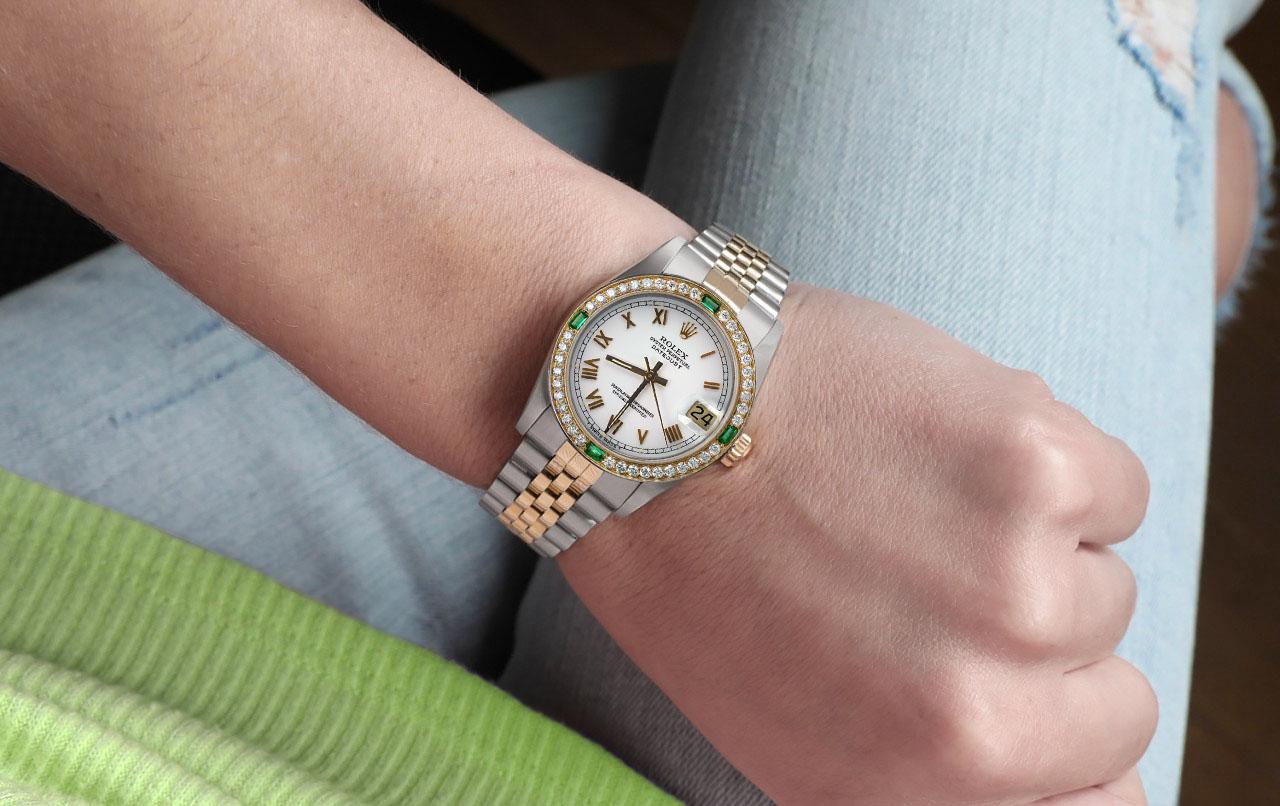 Women's Rolex 31mm Datejust Diamond Bezel with Rubies White Roman Dial Watch

We take great pride in presenting this timepiece, which is in impeccable condition, having undergone professional polishing and servicing to maintain its pristine
