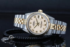 Reloj Rolex Datejust 68274 Bisel estriado Tapones de diamante Esfera color crema 2 tonos