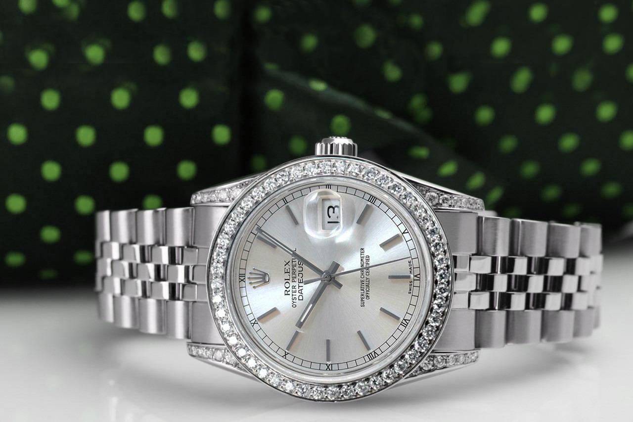 Rolex Datejust 31 mm - Montre femme en acier inoxydable avec cadran à index argenté et lunette à diamants 68274