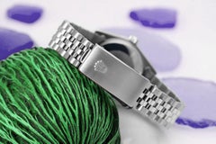 Rolex Datejust Silver Roman Dial with Emeralds & Diamond Bezel + Lugs Watch