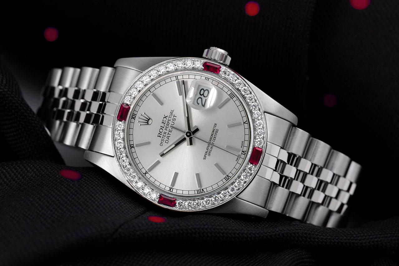 Rolex 31mm Datejust Silver Stick Dial with Diamond & Ruby Bezel Steel Watch

We take great pride in presenting this timepiece, which is in impeccable condition, having undergone professional polishing and servicing to maintain its pristine