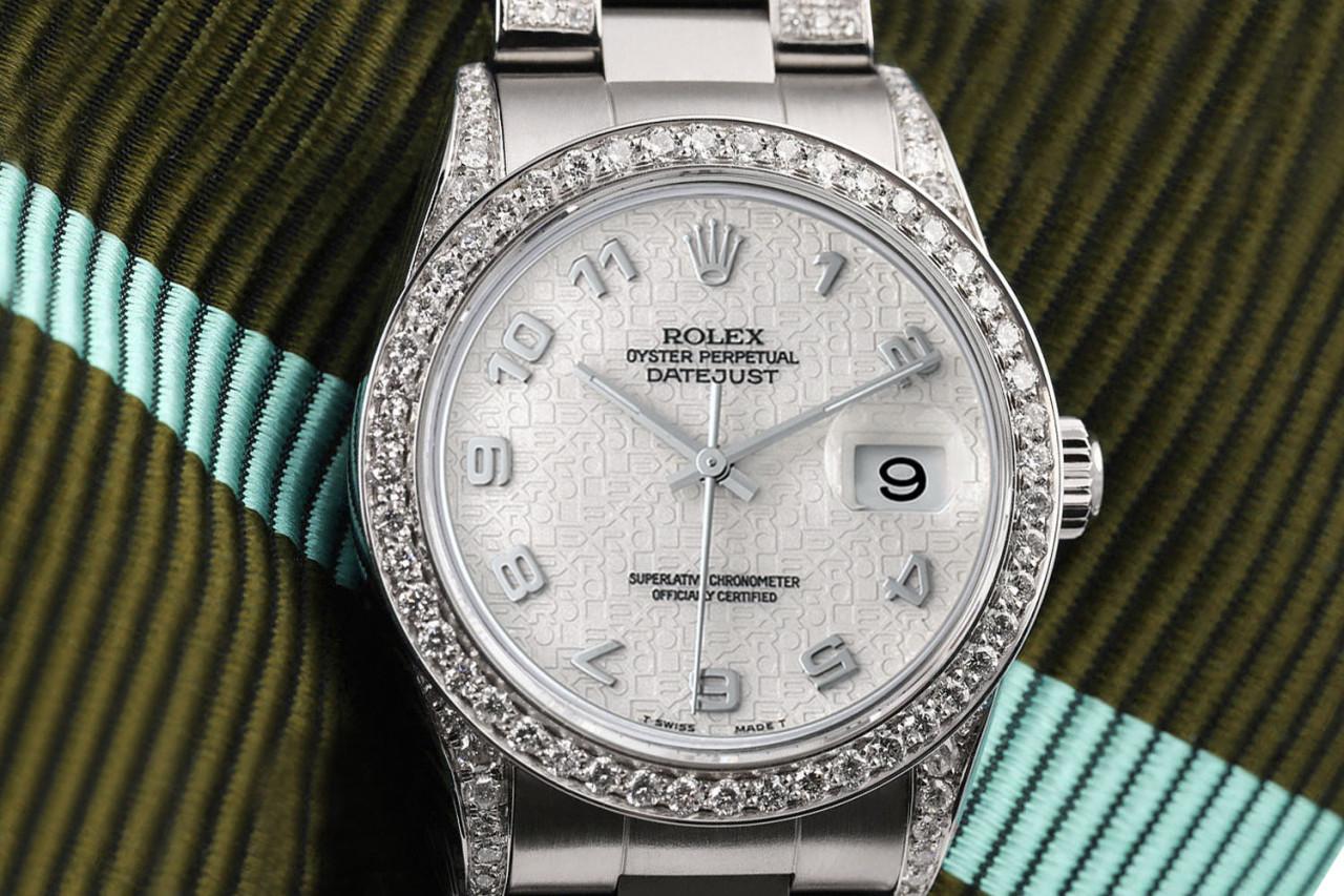 Rolex 31mm Datejust Steel Oyster Band Diamond/Emerald Bezel Silver Dial Watch In Excellent Condition For Sale In New York, NY
