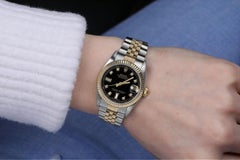 Rolex Datejust zweifarbiges schwarzes Zifferblatt mit 8 + 2 Diamant-Akzent 68273