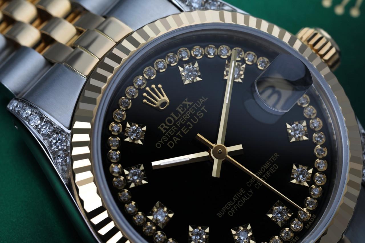 Frauen Rolex 31mm Datejust zwei Ton Vintage geriffelte Lünette mit Lugs glänzend schwarz String Akzent Zifferblatt 68274

Diese Uhr ist in neuwertigem Zustand. Es wurde poliert, gewartet und hat keine sichtbaren Kratzer oder Flecken. Alle unsere