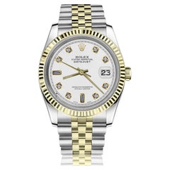 Rolex Montre Datejust 31 mm de couleur blanche avec cadran bicolore et diamant baguette 68273