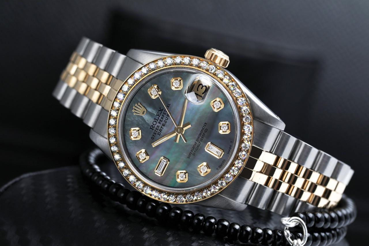 Women's Rolex 31mm Datejust Vintage Diamond Bezel Two Tone Black MOP Mother Of Pearl with 8 + 2 Diamond Accent 68273

This watch is in like new condition. It has been polished, serviced and has no visible scratches or blemishes. All our watches come