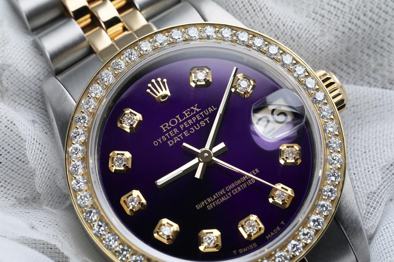 Women's Rolex 31mm Datejust Vintage Diamond Bezel Two Tone Purple Color Dial 68273

This watch is in like new condition. It has been polished, serviced and has no visible scratches or blemishes. All our watches come with a standard 1 year mechanical