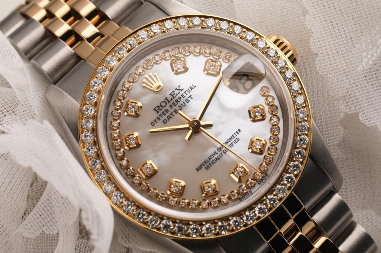 Women's Rolex 31mm Datejust Vintage Diamond Bezel Two Tone White MOP Mother of Pearl String Diamond Dial 68273

This watch is in like new condition. It has been polished, serviced and has no visible scratches or blemishes. All our watches come with
