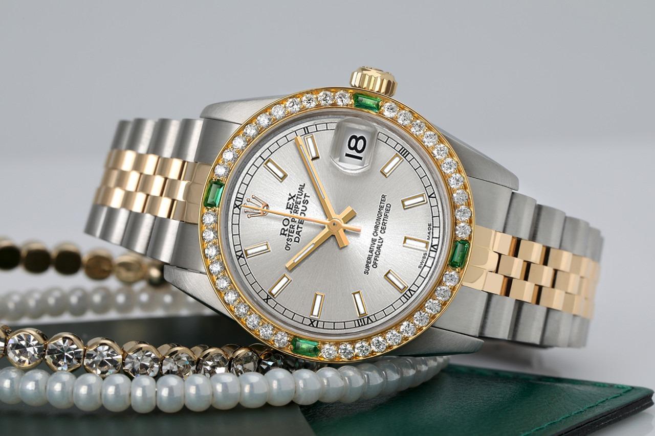 Women's Rolex 31mm Datejust Vintage Diamond Bezel with Emeralds Silver Index Dial Two Tone Watch 68273

Bracelets are NOT included in the sale.
