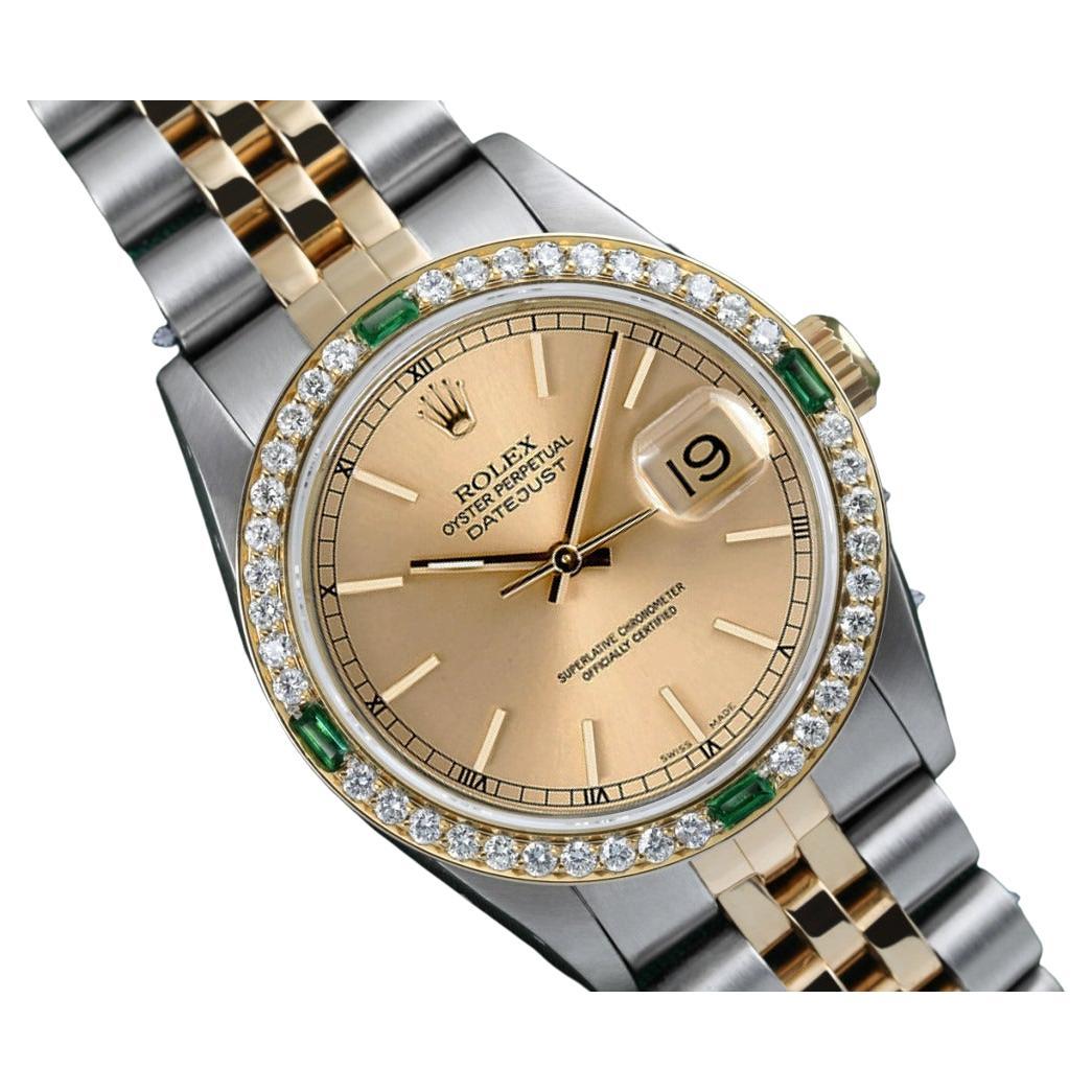 Rolex Montre Datejust 68273 vintage avec lunette en diamants et cadran émeraudes bicolore champagne