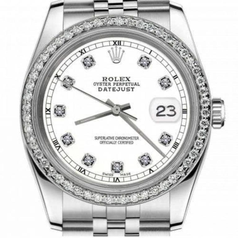 Rolex 31mm Datejust With Custom Diamond bezel SS White Color Dial with Diamond Accent RT Deployment buckle 68274

This watch is in like new condition. It has been polished, serviced and has no visible scratches or blemishes. All our watches come