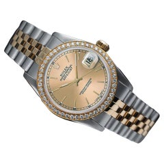 Rolex Montre Datejust 68273 bicolore pour femme avec lunette en diamant et cadran champagne
