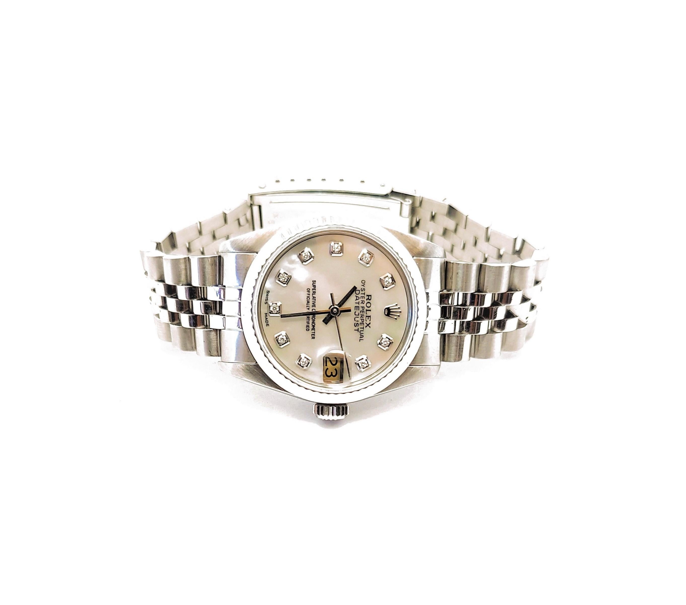 Brand - Rolex
Model - 68274 Datejust 
Case Size - 31mm 
Metals - Steel/White gold
Bezel - White Gold Fluted
Crystal - Sapphire
Dial - MOP Diamond
Movement - Rolex CAL.2135
Wrist Band - Stainless Steel Jubilee
Wrist Size - 7 inches 

3 YEAR IN HOUSE