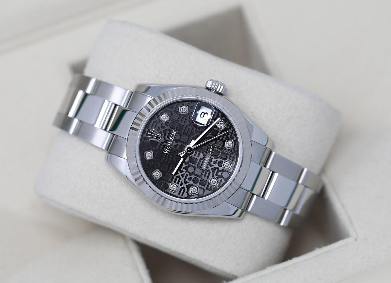 Rolex 31mm Lady-Datejust 178274 Black Rolex Logo Anniversary Diamond Dial Stainless Steel Watch
 
We are a premiere distributor of pre-owned and new watches, where we guarantee complete authenticity and corresponding aesthetic to all of our