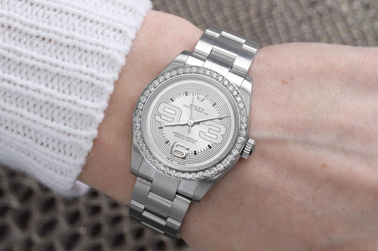 Rolex Oyster Perpetual Ladies Stainless Steel Watch with Diamond Bezel In Excellent Condition For Sale In New York, NY