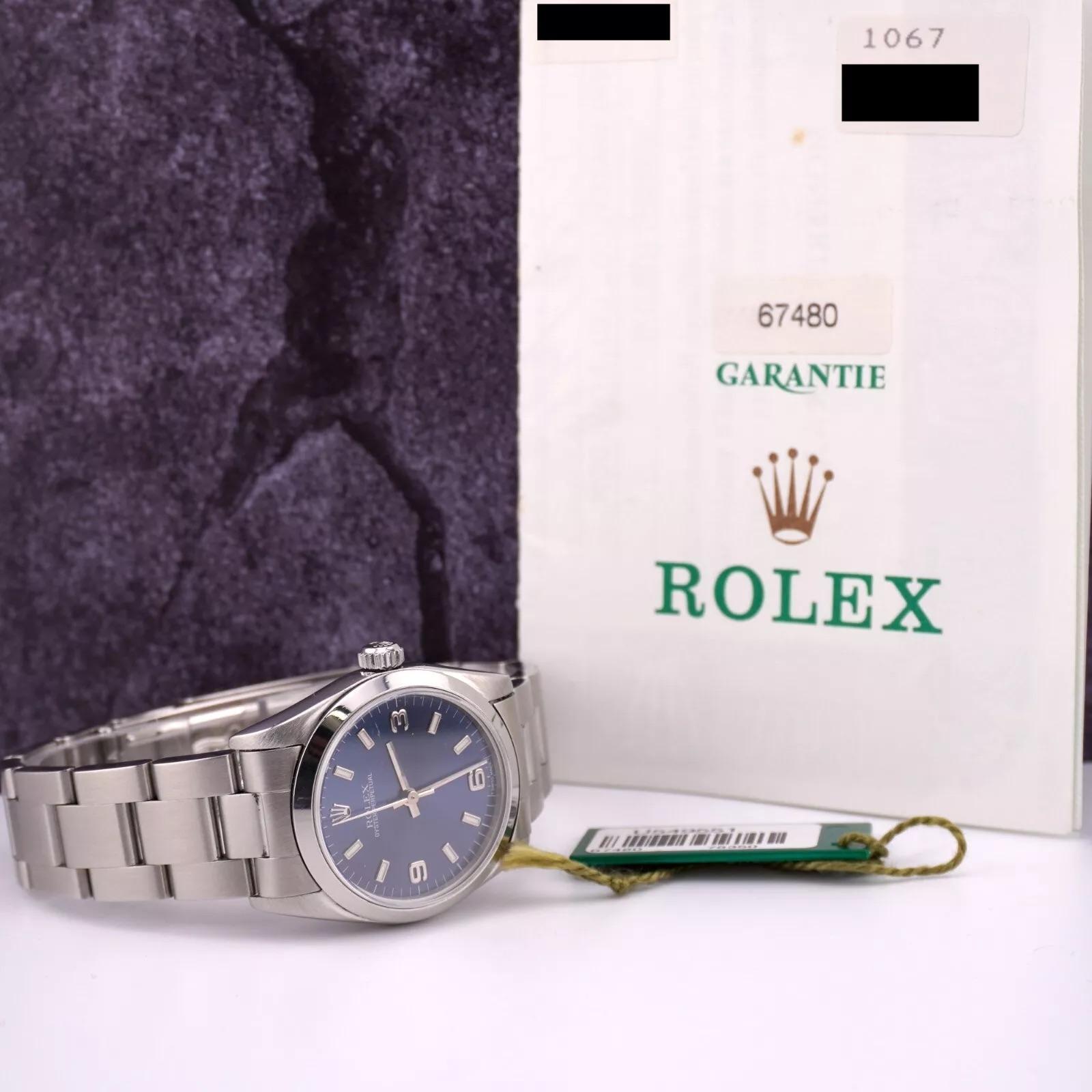 Rolex 31mm Oyster Perpetual Ladies Steel Smooth Blue Arabic Dial Watch Ref 67480 For Sale 1