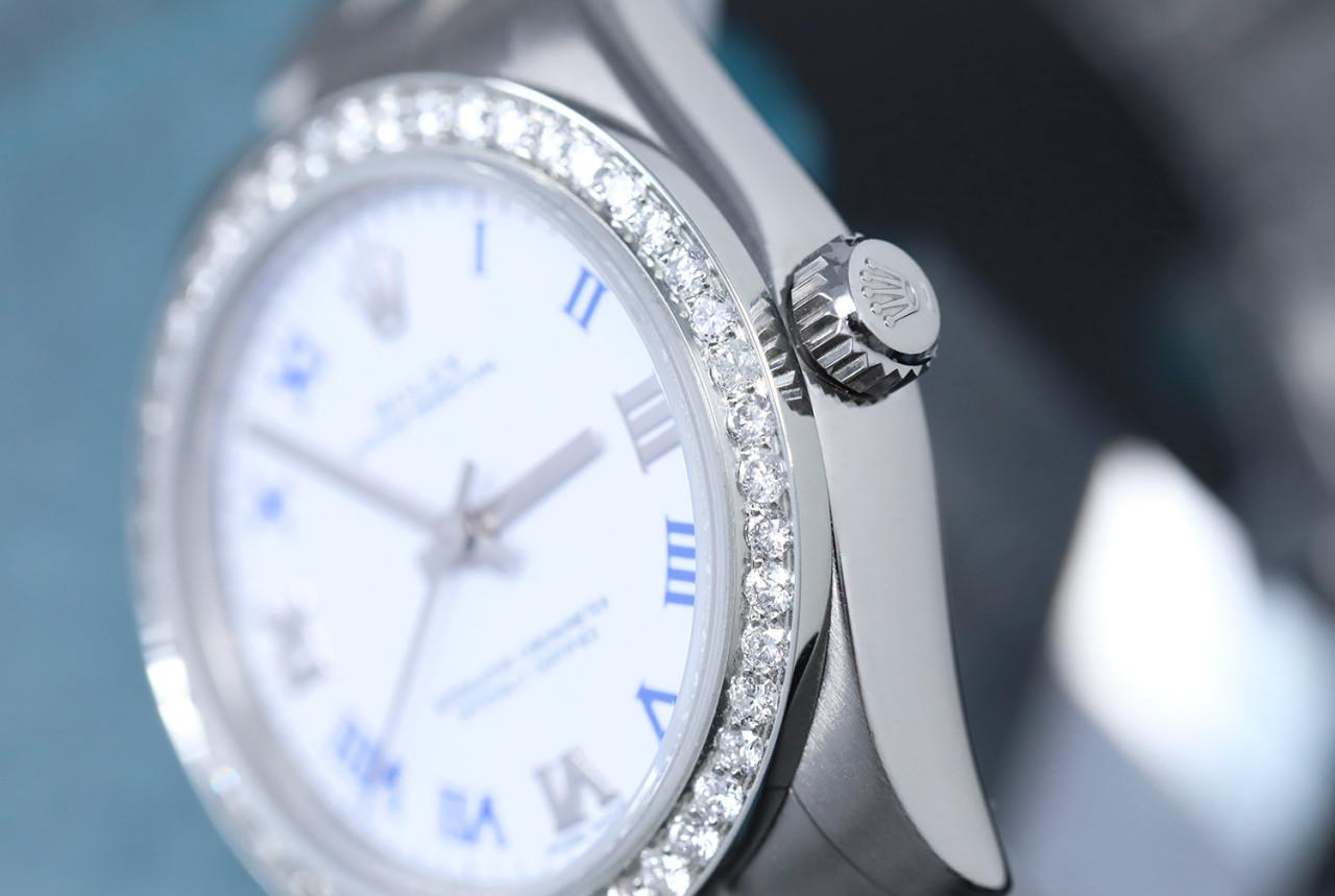 Rolex 31mm Oyster Perpetual Ladies Stainless Steel Watch cadran blanc chiffres bleus lunette diamant 177200

Cette montre est dans un état comme neuf. Elle a été polie, entretenue et ne présente aucune rayure ou imperfection visible. Toutes nos